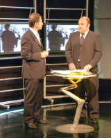 El director de Ingresos Judiciales, Rubén Ayala Olmedo y el conductor del noticiero, Benito Fleitas