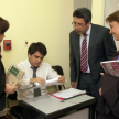 Algunos profesionales registrándose para ingresar al curso.