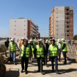 El presidente de la máxima instancia judicial y una comitiva recorriendo la zona de construcción de las obras.