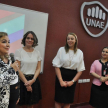 Autoridades de la Corte Suprema y la UNAE dirigiéndose a los participantes.