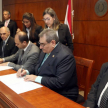 El presidente de la Corte, doctor Antonio Fretes, y el titular de la Universidad Americana, Dr. Héctor Guillermo González, firmando el convenio.