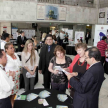 Los representantes del CEJ, CIRD y USAID observando los stands.