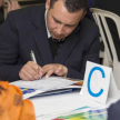 Capacitación a magistrados, funcionarios y técnicos.