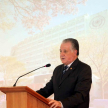 El ministro Victor Núñez dando las palabras de apertura 