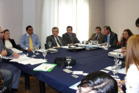 Los Defensores Carlos Flores y Marino Daniel Méndez durante la reunión de Defensores Públicos del MERCOSUR