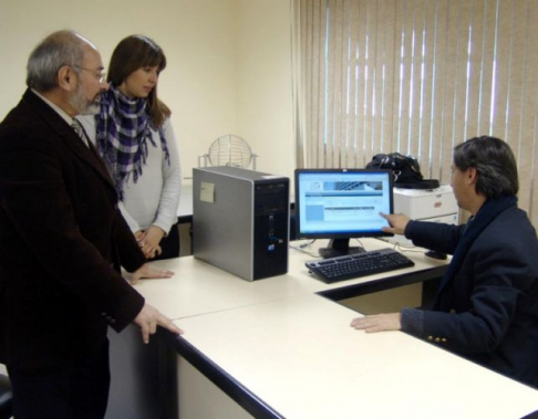 El doctor Carlos Enciso y el magistrado Carlos Ortiz Barrios, en el sorteo informatico para la designación de jueces para las causas ingresadas el 23 de julio.
